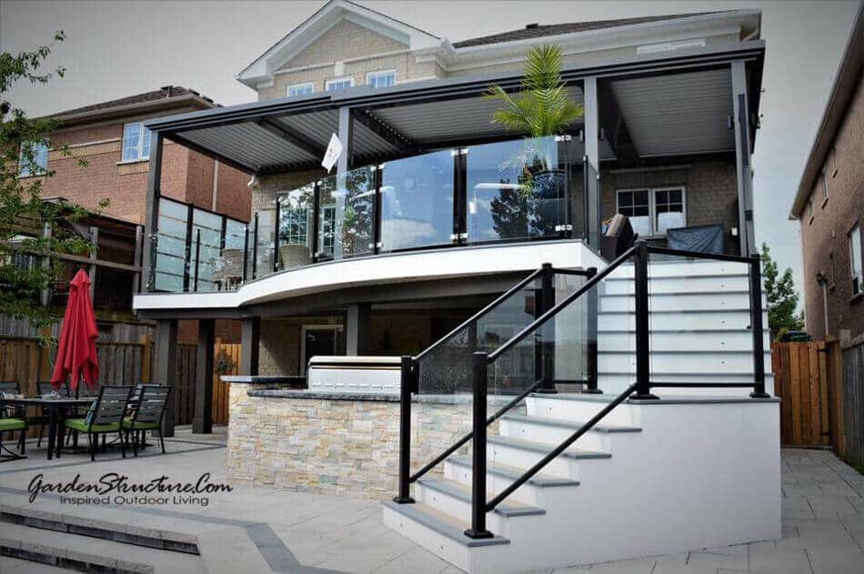 Stunning modern curved deck with large stairs.