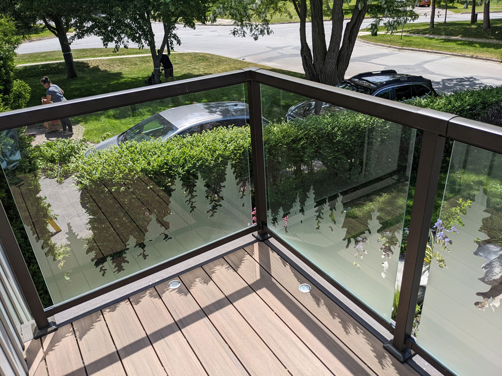 Glass rails on a PVC deck in Barrie