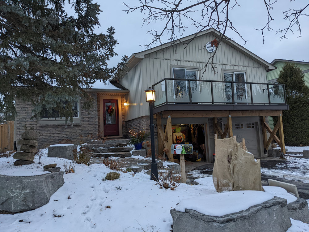Second level deck above garage doors