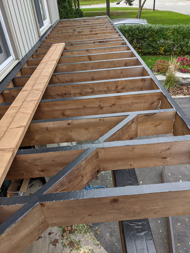 Second level deck in Barrie framing for Strength