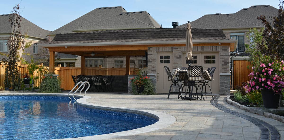 a pool house with a chef's kitchen